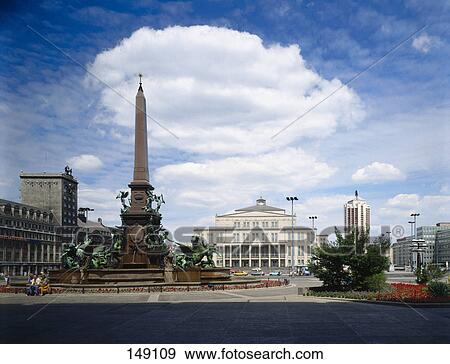 Stock Photo - Sculptures at water fountain in city square, Augustus Square, Leipzig, Saxony, Germany . Fotosearch