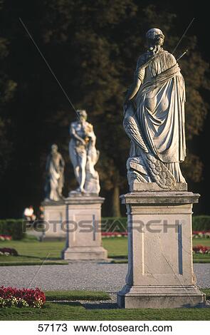 Stock Image - Sculptures in park, Nymphenburg Palace, Munich, Bavaria, Germany . Fotosearch