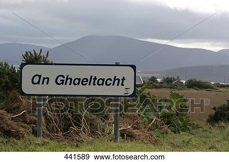 Stock Photo - Signboard on rural landscape under overcast sky, Achill Island, County Mayo, Ireland . Fotosearch