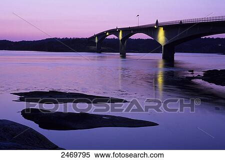 Stock Photography - Silhouette of bridge across sea, Schmoegen, Sweden . Fotosearch