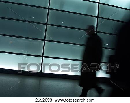 Silhouette of person walking in tunnel, Potsdamer Platz, Berlin, Germany View Large Photo Image Stock Image - Silhouette of person walking in tunnel, Potsdamer Platz, Berlin, Germany . Fotosearch