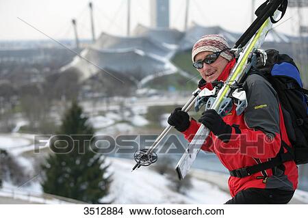 Picture - Skier in front of Olympiapark, Munich, Germany . Fotosearch