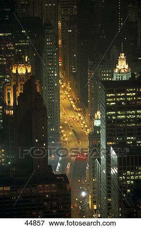 Stock Photo - Skyscraper and road in city viewed from John Hancock Center, Wrigley Building, Michigan Avenue, Chicago, Illinois, USA . Fotosearch