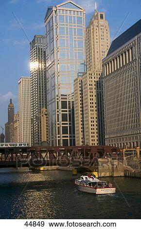 Stock Photo - Skyscrapers along river, R. R. Donnelley Center, Wacker Drive, Chicago River, Chicago, Illinois, USA . Fotosearch