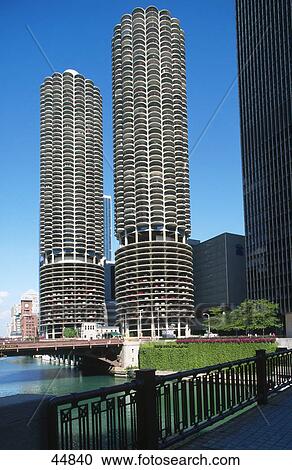 Stock Image - Skyscrapers at riverside, Marina Towers, Marina City, Chicago, Illinois, USA . Fotosearch