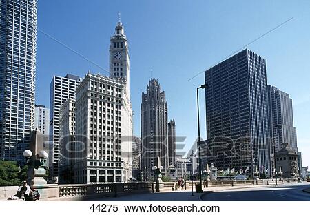 Stock Photography - Skyscrapers in city, Wrigley Building, Michigan Avenue, Chicago, Illinois, USA . Fotosearch