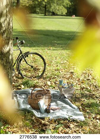 Slice of bread with jam and coffee cup on table in park View Large Photo Image Stock Photo - Slice of bread with jam and coffee cup on table in park . Fotosearch