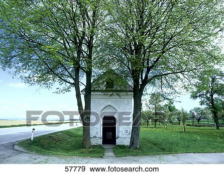 Stock Photo - Small white chapel between trees, Luberon, Provence-Alpes-Cote d'Azur, France . Fotosearch