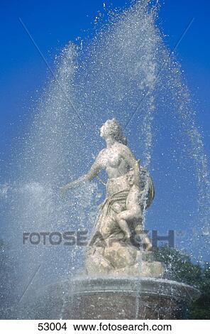 Picture - Statue at fountain, Latona Fountain, Herrenchiemsee Castle, Bavaria, Germany . Fotosearch