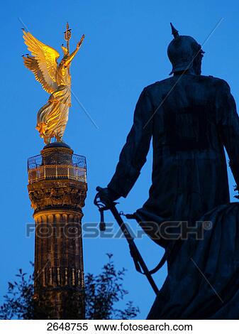 Statue in front of tower, Berlin Victory Column, Tiergarten, Berlin, Germany View Large Photo Image Stock Photography - Statue in front of tower, Berlin Victory Column, Tiergarten, Berlin, Germany . Fotosearch