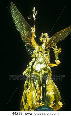 Stock Photo - Statue of angel of peace at night, Munich, Bavaria, Germany . Fotosearch
