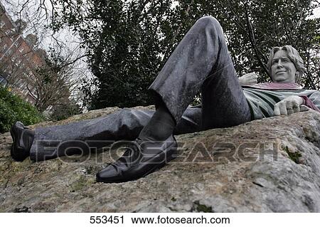 Statue of Oscar Wilde on rock, Dublin, Dublin County, Leinster, Ireland View Large Photo Image Stock Image - Statue of Oscar Wilde on rock, Dublin, Dublin County, Leinster, Ireland . Fotosearch