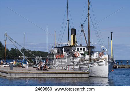 Stock Image - Steamboat at harbor, Hjo, Vaestra Goetaland County, Sweden . Fotosearch