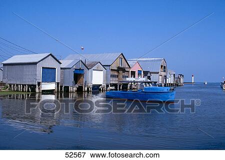 Stock Photo - Stilt houses at lakeside, Lake Erie, Ontario, Canada . Fotosearch