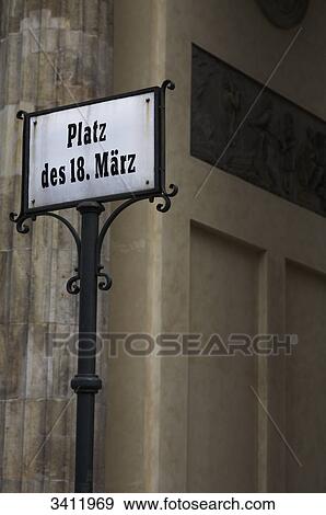 Street sign "Platz des 18. Maerz" at Brandenburger Tor, Berlin, Germany, Europe View Large Photo Image Stock Photo - Street sign "Platz des 18. Maerz" at Brandenburger Tor, Berlin, Germany, Europe . Fotosearch