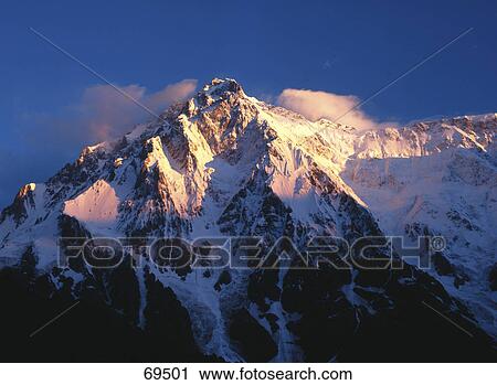 Sunshine at morning on snowcapped mountain peak, Nanga Parbat, Pakistan View Large Photo Image Stock Image - Sunshine at morning on snowcapped mountain peak, Nanga Parbat, Pakistan . Fotosearch
