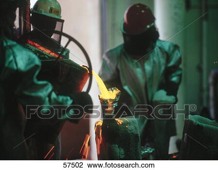 Three people working in smelting plant, New Mexico, USA View Large Photo Image Stock Image - Three people working in smelting plant, New Mexico, USA . Fotosearch