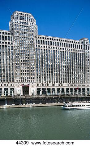 Stock Photo - Tourboat in river, Merchandise Mart, Kennedy Clan, Chicago River, Chicago, Illinois, USA . Fotosearch