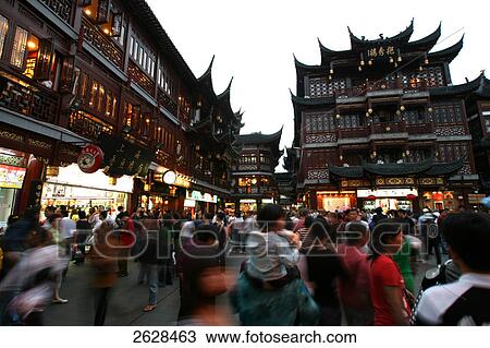 Stock Image - Tourists at market, Yuyuan Garden Bazaar, Shanghai, China . Fotosearch