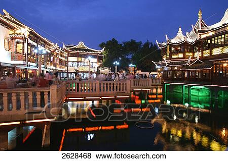 Tourists at market, Yuyuan Garden Bazaar, Shanghai, China View Large Photo Image Stock Photo - Tourists at market, Yuyuan Garden Bazaar, Shanghai, China . Fotosearch