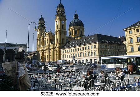 Tourists at outdoor cafe, Odeonsplatz Square, St. Cajetan, Munich, Germany View Large Photo Image Stock Photo - Tourists at outdoor cafe, Odeonsplatz Square, St. Cajetan, Munich, Germany . Fotosearch