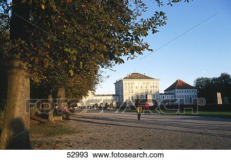Tourists at palace grounds, Nymphenburg Castle, Munich, Bavaria, Germany View Large Photo Image Stock Image - Tourists at palace grounds, Nymphenburg Castle, Munich, Bavaria, Germany . Fotosearch