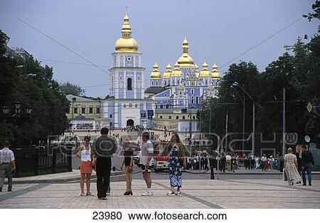 Stock Image - Tourists in front of monastery, St. Michael's Golden-Domed Monastery, Kiev, Ukraine . Fotosearch