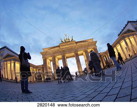 Tourists in front of monument, Brandenburg Gate, Berlin, Germany View Large Photo Image Stock Photo - Tourists in front of monument, Brandenburg Gate, Berlin, Germany . Fotosearch