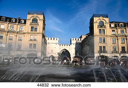 Tourists near fountain, Karlsplatz, Stachus, Munich, Germany View Large Photo Image Stock Image - Tourists near fountain, Karlsplatz, Stachus, Munich, Germany . Fotosearch