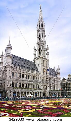 Stock Image - Town hall and flower bed at Grote Markt, Brussels, Belgium, Europe . Fotosearch