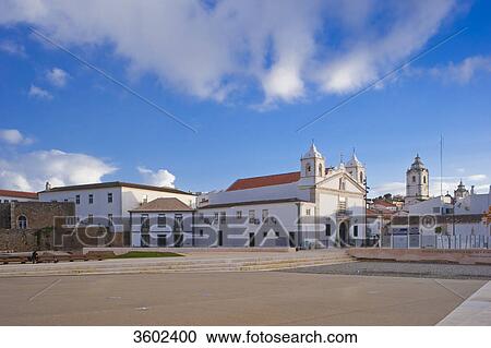 Stock Image - Townscape with the church Igreja Santa Maria, Lagos, Algarve, Portugal . Fotosearch