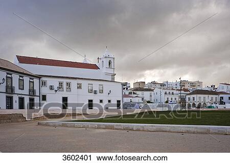 Stock Image - Townscape with the church Igreja Santa Maria, Lagos, Algarve, Portugal . Fotosearch