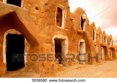 Stock Image - Traditional granaries (ghorfas) at the southtunisian city of Medenine . Fotosearch