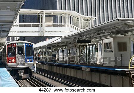 Stock Photo - Tram at station, L. Adams Street, Chicago, Illinois, USA . Fotosearch
