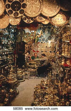 Stock Photography - Two people inside souvenir store, Istanbul, Turkey . Fotosearch