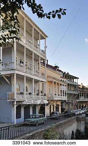 Stock Image - Typical wodden balconies at old builings, Tbilisi, Georgia . Fotosearch