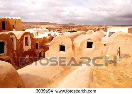 Picture - View over the roofs of the traditional granaries (ghorfas) at the southtunisian city of Medenine . Fotosearch
