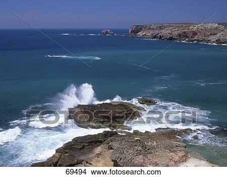 Waves crashing on rocks, Algarve, Portugal View Large Photo Image Picture - Waves crashing on rocks, Algarve, Portugal . Fotosearch