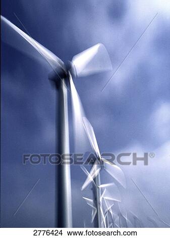 Wind turbines against sky View Large Photo Image Picture - Wind turbines against sky . Fotosearch