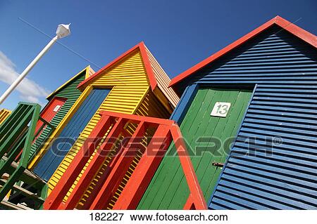 Stock Photo - Wooden huts on beach . Fotosearch