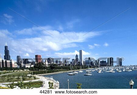 Yachts at harbor with city skyline in background, Aon Building, Amoco Building, Sears Tower, Chicago, Illinois, USA View Large Photo Image Stock Image - Yachts at harbor with city skyline in background, Aon Building, Amoco Building, Sears Tower, Chicago, Illinois, USA . Fotosearch