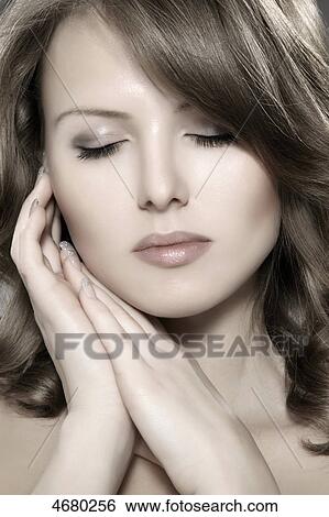Stock Photograph - Young woman, portrait . Fotosearch