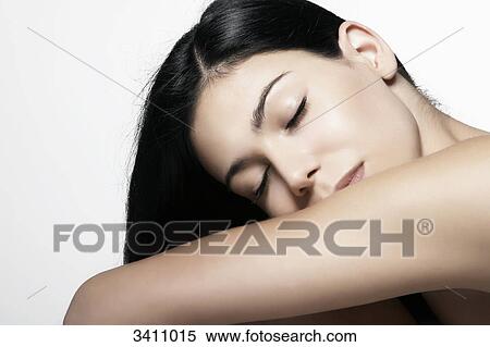 Young woman with closed eyes, portrait View Large Photo Image Stock Photography - Young woman with closed eyes, portrait . Fotosearch
