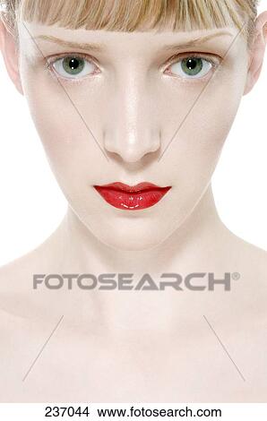 Young woman with lipstick, portrait View Large Photo Image Picture - Young woman with lipstick, portrait . Fotosearch