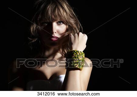 Young woman with necklace from ananas View Large Photo Image Stock Photograph - Young woman with necklace from ananas . Fotosearch