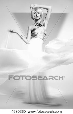 Stock Image - Young woman with wig posing . Fotosearch