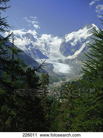 Aerial view of valley with mountain range in background, Morteratsch Glacier, Piz Bernina, Switzerland View Large Photo Image Stock Image - Aerial view of valley with mountain range in background, Morteratsch Glacier, Piz Bernina, Switzerland . Fotosearch