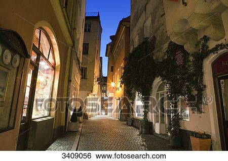 Alley in the old town of Regensburg, Germany View Large Photo Image Stock Photograph - Alley in the old town of Regensburg, Germany . Fotosearch