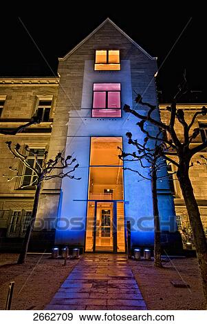 Stock Photo - Bare trees in front of building . Fotosearch