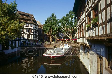 Boat in canal, Strasbourg, Alsace, France View Large Photo Image Stock Photography - Boat in canal, Strasbourg, Alsace, France . Fotosearch